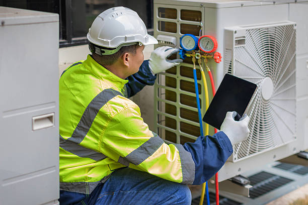 Professional Air Conditioning Repair technician working in Babson Park, MA
